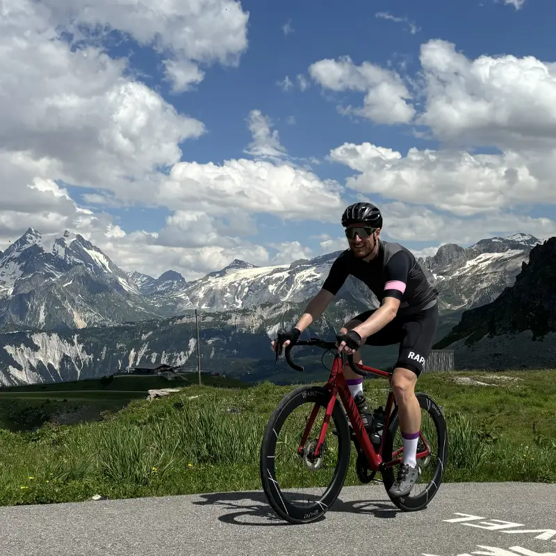 Rider at the top of the Col de la Loze, epic climbs french alps