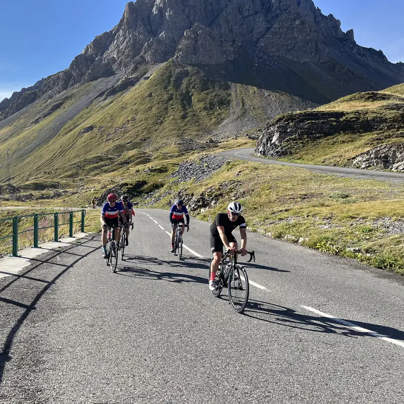 Riders on the Col du Galibier, epic climbs french alps